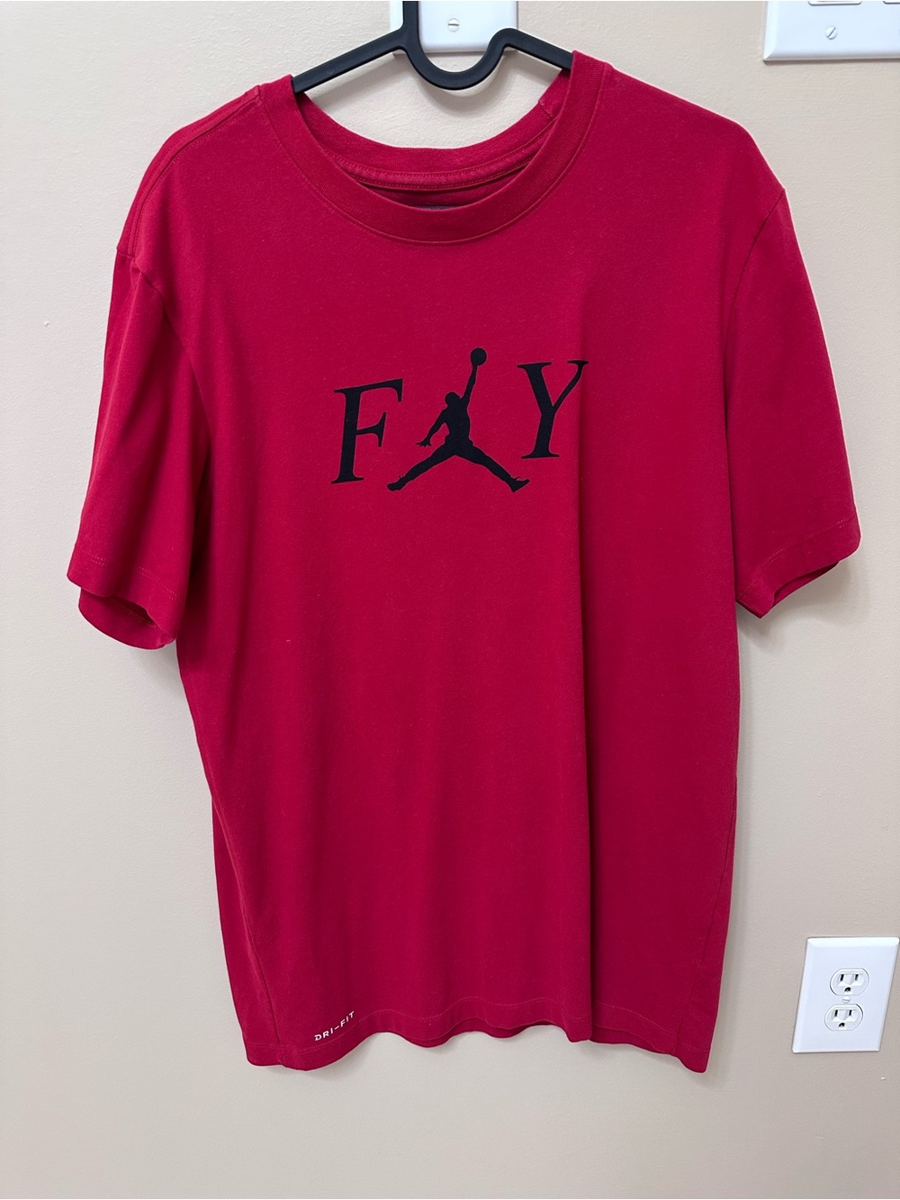 Jordan Men's Red Short Sleeve Tee with Black Jumpman Graphic